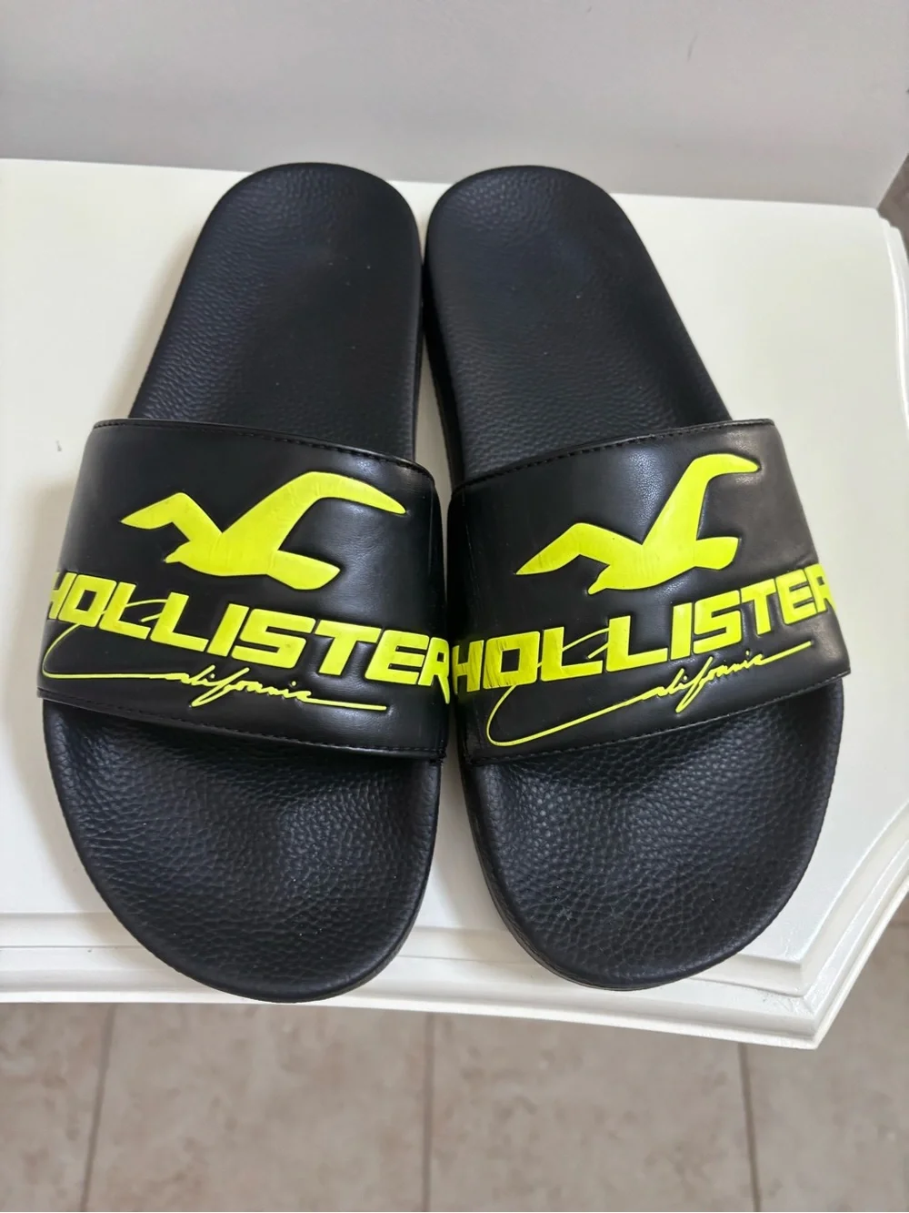 Hollister Black Slides with Neon Yellow Logo 8-9